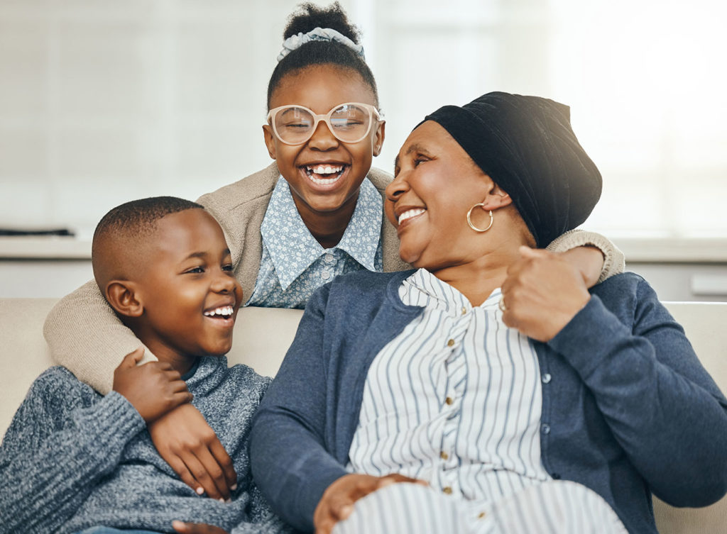 a family smiling at each other